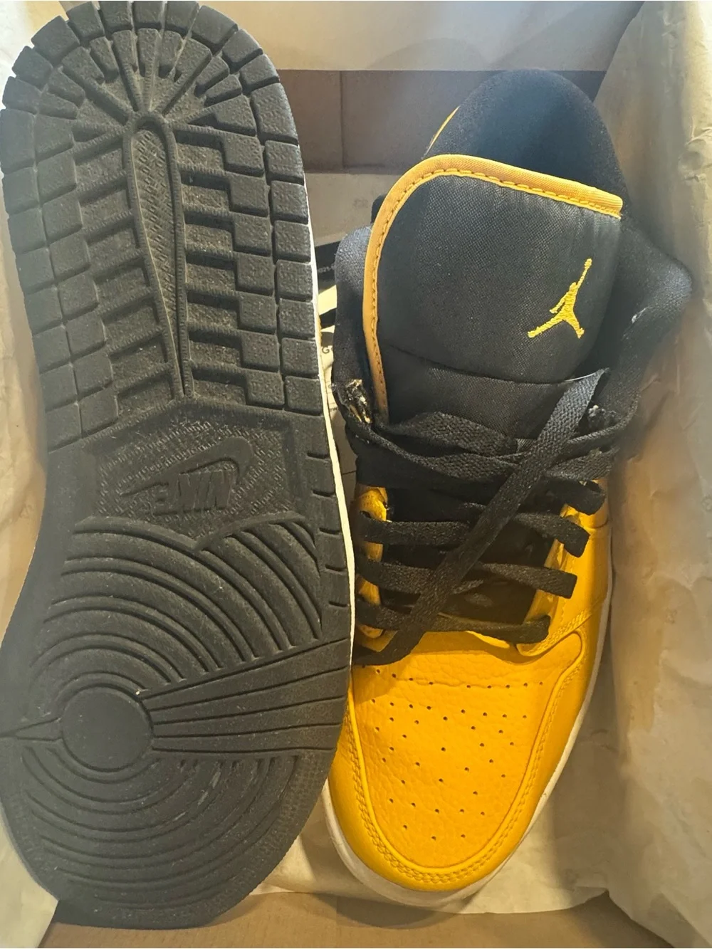 Jordan 1 Low University Gold